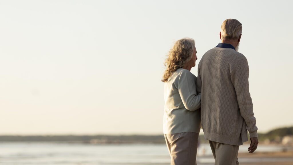 A couple walking on a beach